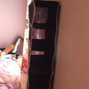 Brown hanging closet shoe hanger